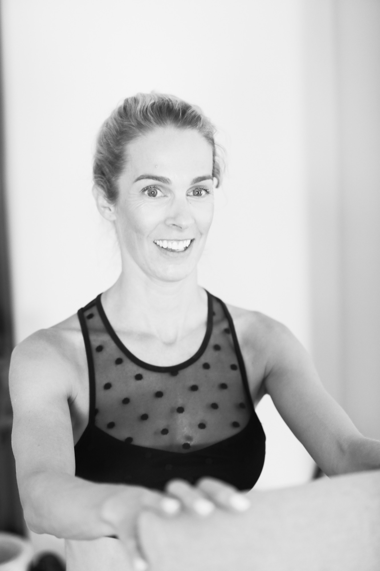 Olivia coaching a Mat Pilates session